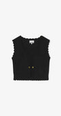 Vest with crocheted appliqué