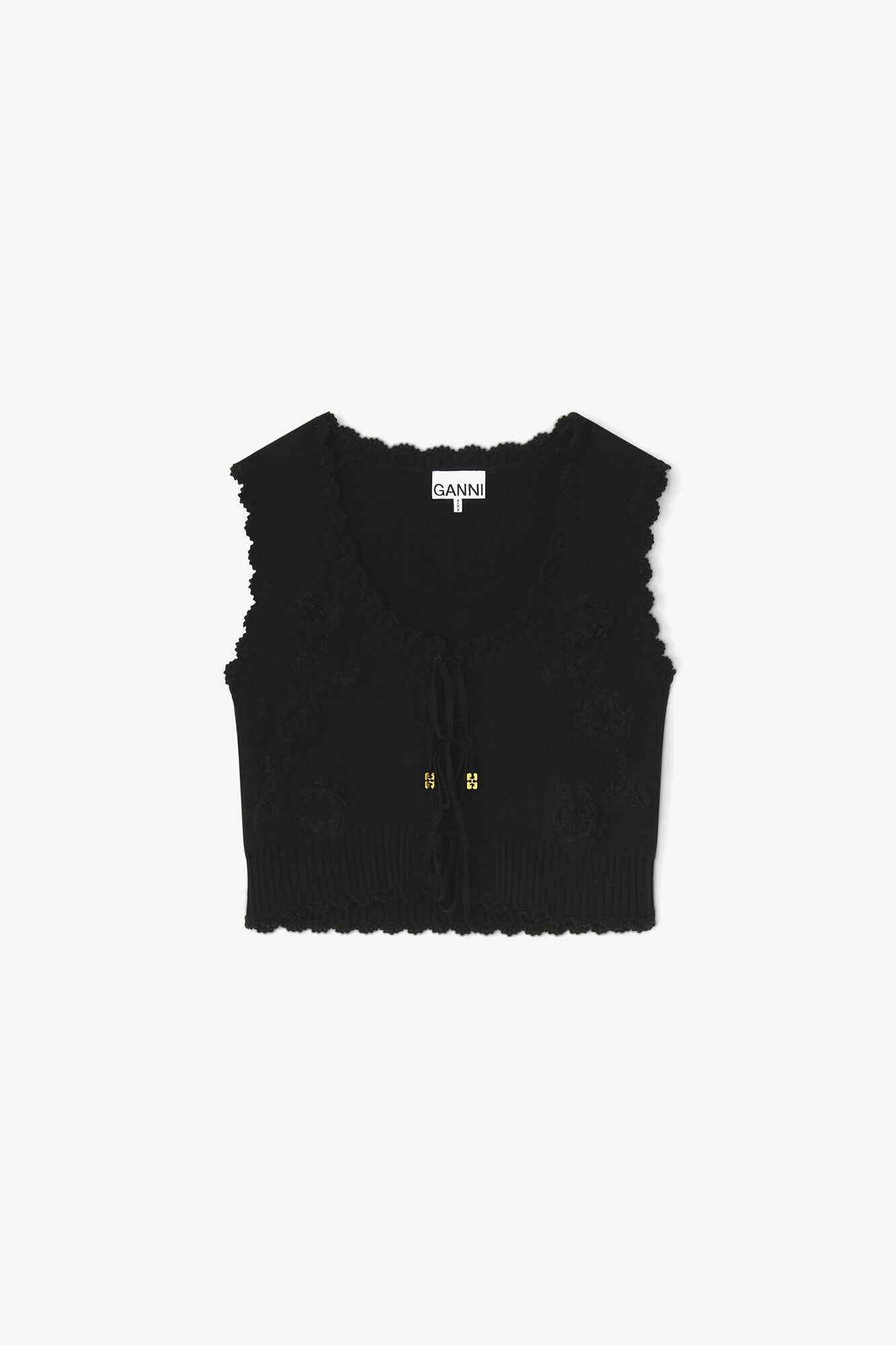 Vest with crocheted appliqué